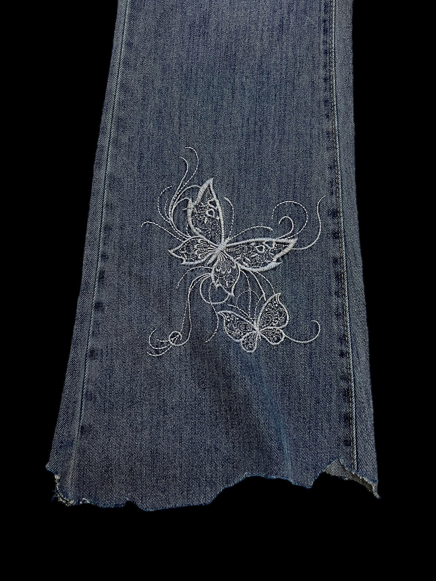 Embroidered butterfly jeans